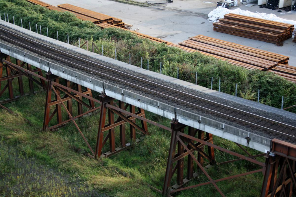train-track-is-shown-with-bridge-background.jpg